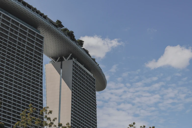 a building that has a wind turbine on top