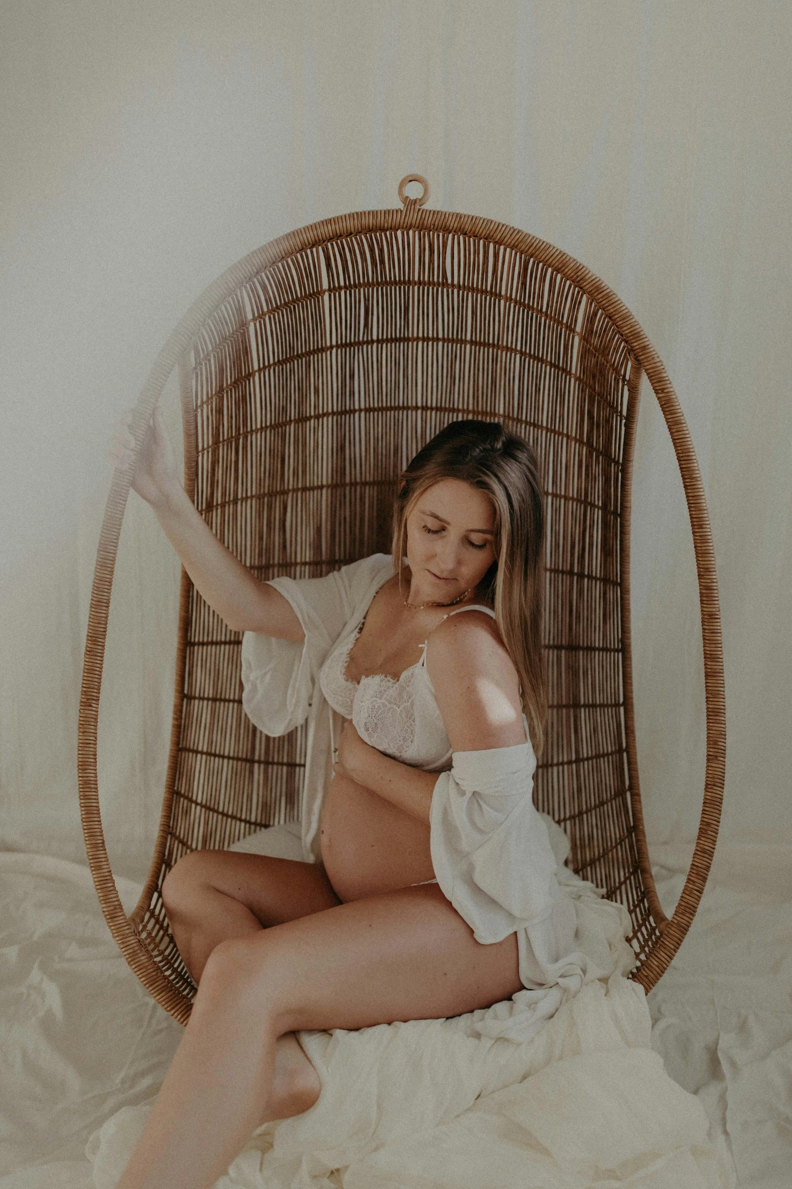 a woman is posing in a white cquet