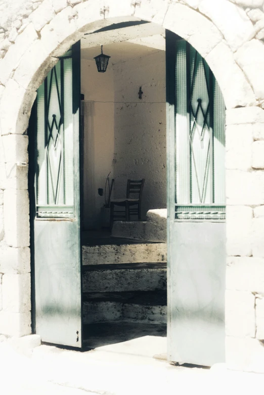 the doors are open to reveal an outside porch