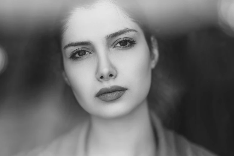 black and white pograph of a woman with a dramatic look