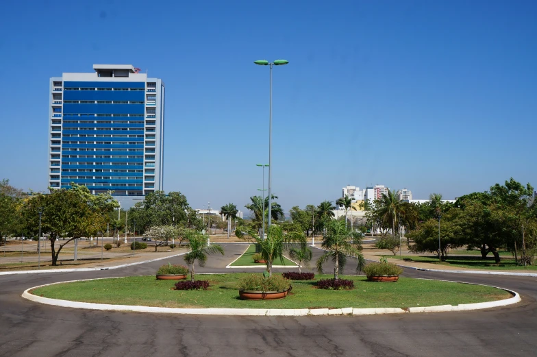 a view of a blue office building that is across the street from it