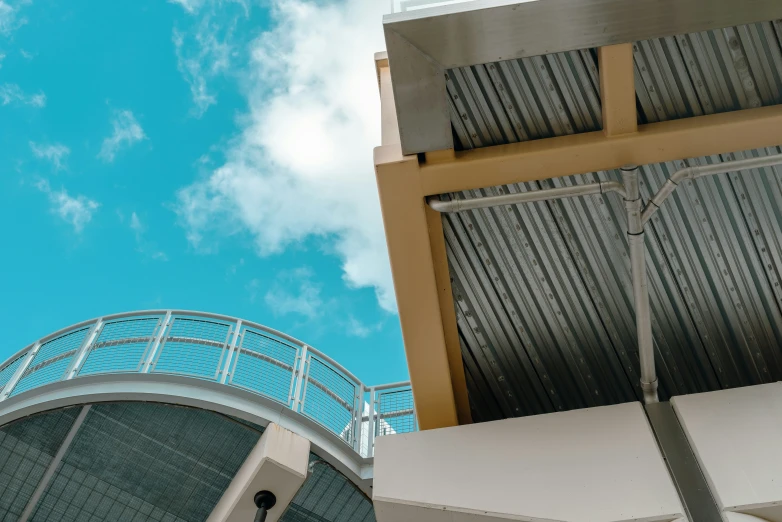 the tower of an overpass with an arched door below