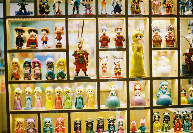 a variety of various miniature figurines are displayed