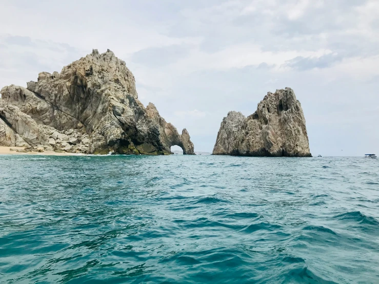 two large rock formations in the ocean