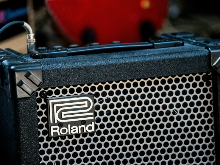 a guitar amplifier is showing the logo on the cover