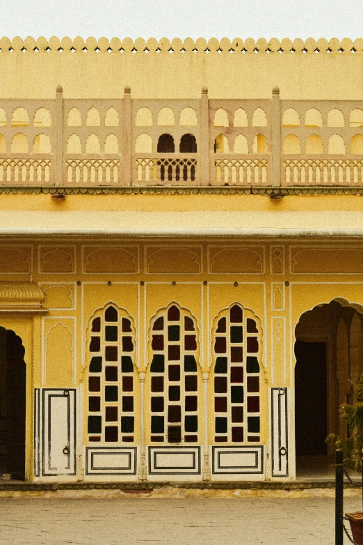 a courtyard with open doors and balconies