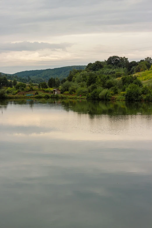 there is a body of water that appears to be in the countryside