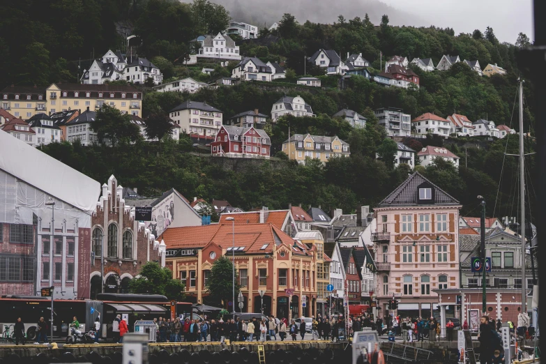 a row of buildings in a city on a hillside