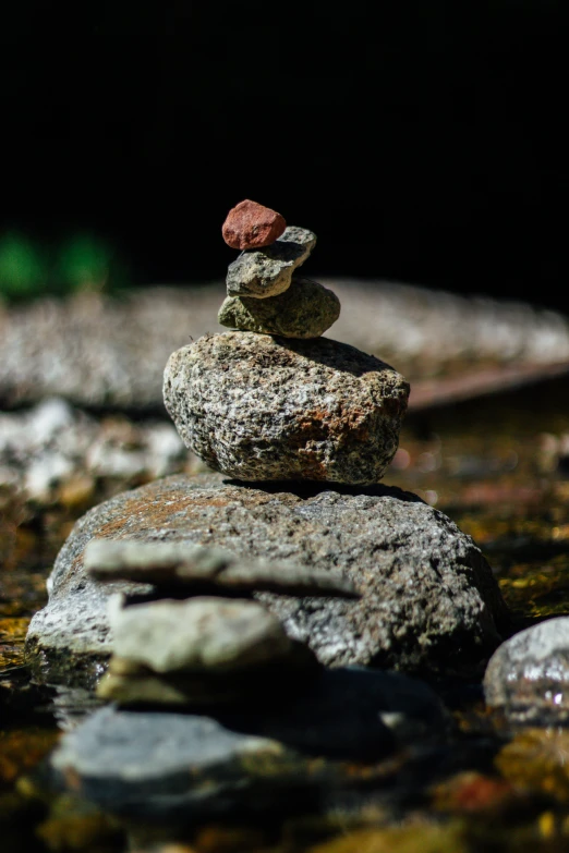two rocks that are stacked on top of each other