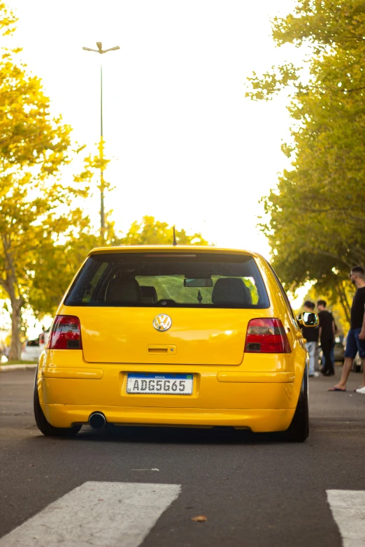 the back end of a yellow vw jett jett jett