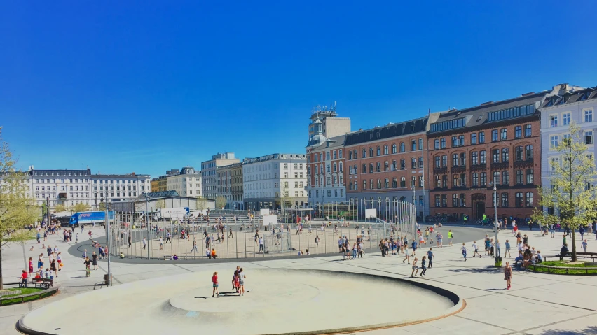 an outdoor square with people playing on it