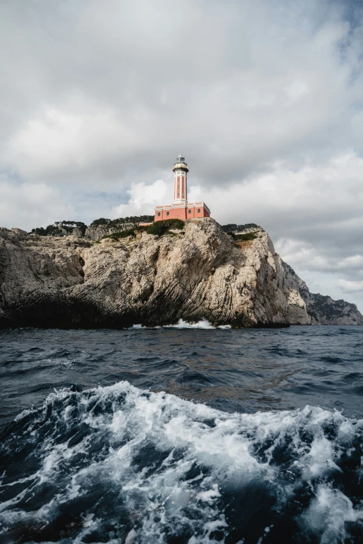 this is a view of a rocky coastline that has waves approaching it