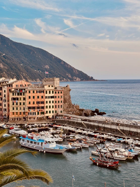 an image of an old harbor town on the coast