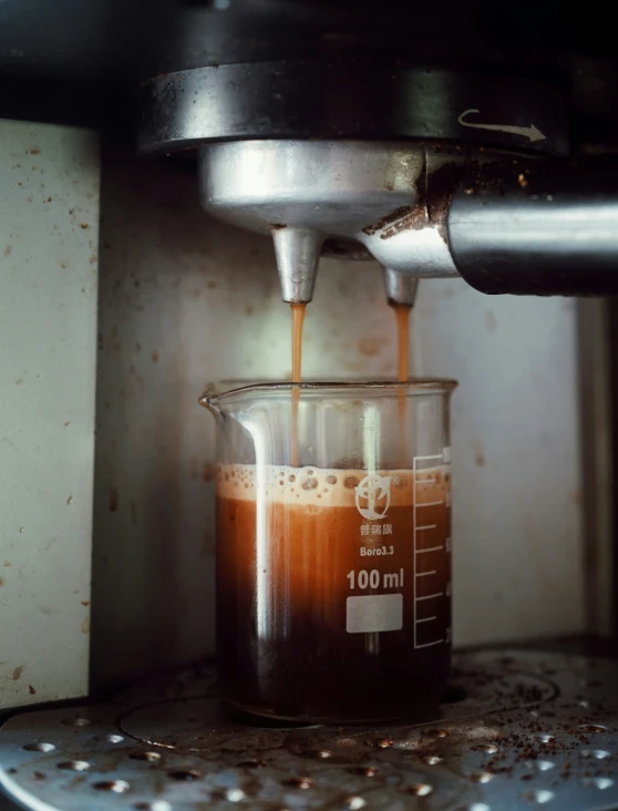 a carafe is filled with liquid being prepared for an experiment