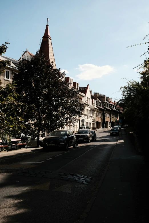 a building is located next to an empty road