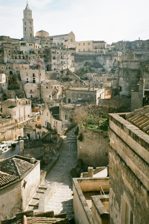 a village with a few old buildings and stone roofs