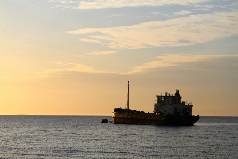 a boat that is floating on a large body of water