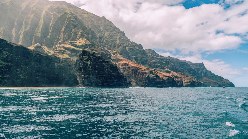 the ocean and mountains are dotted with water