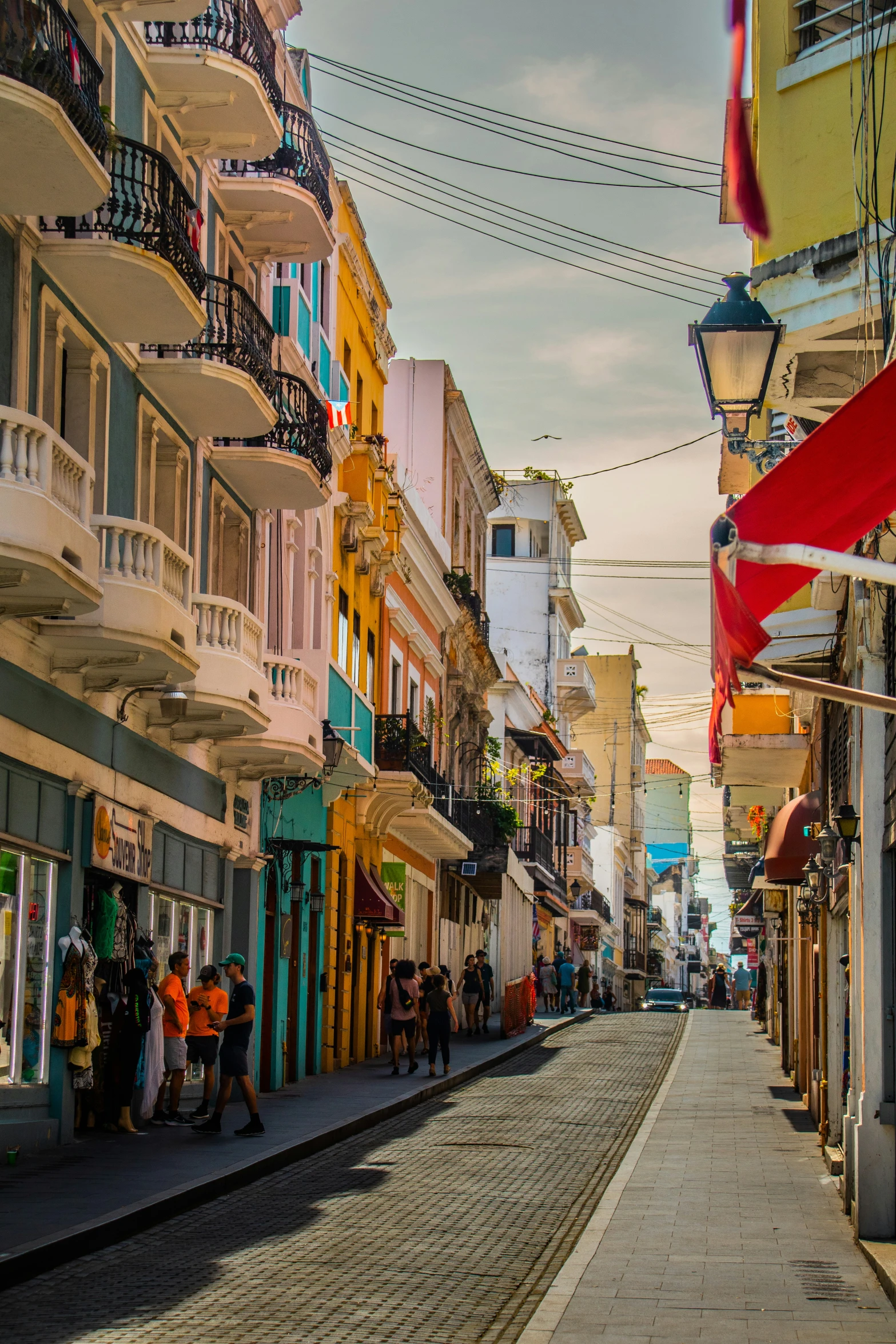 the sidewalk in front of some buildings