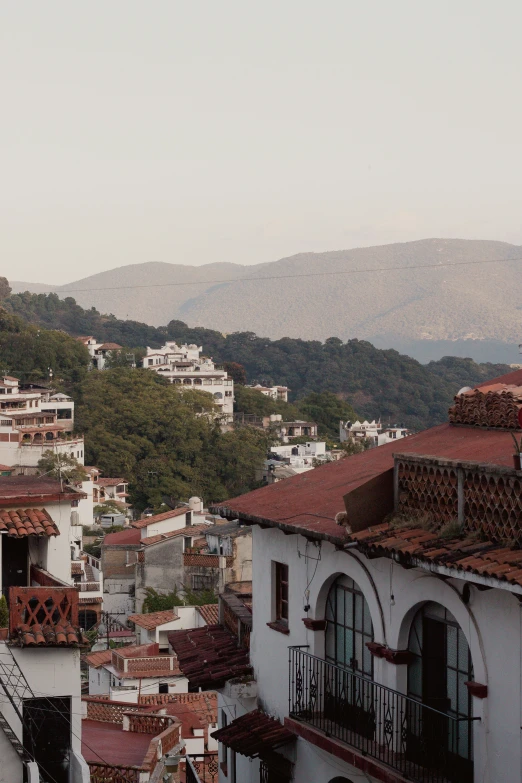 a town with a mountain in the background