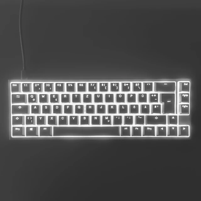 a white glowing keyboard and a black background