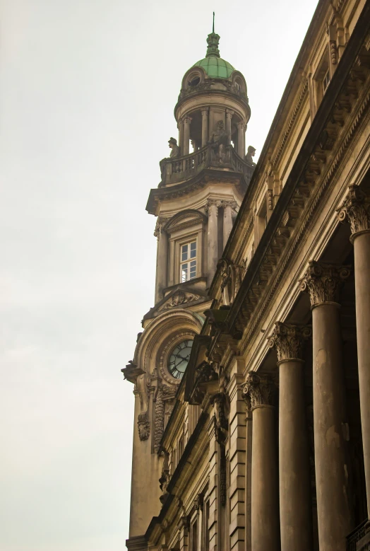 a clock that is on the side of a building