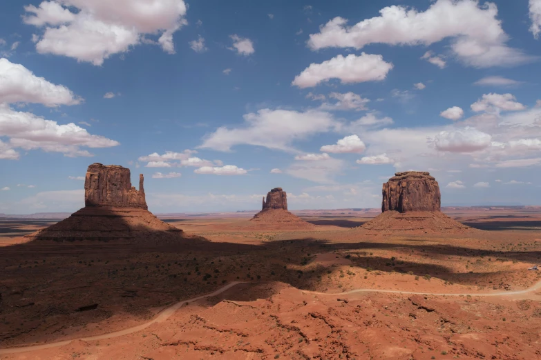 the desert is filled with large mounds that resemble old rock formations