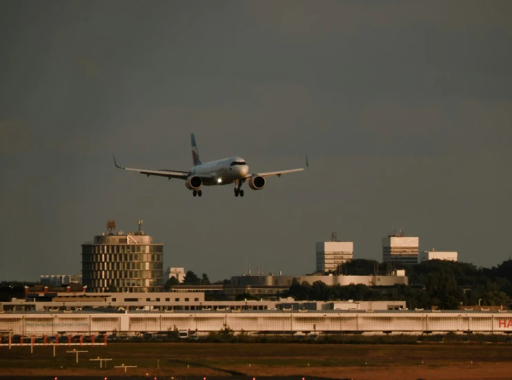 large jetliner taking off over urban city skyline