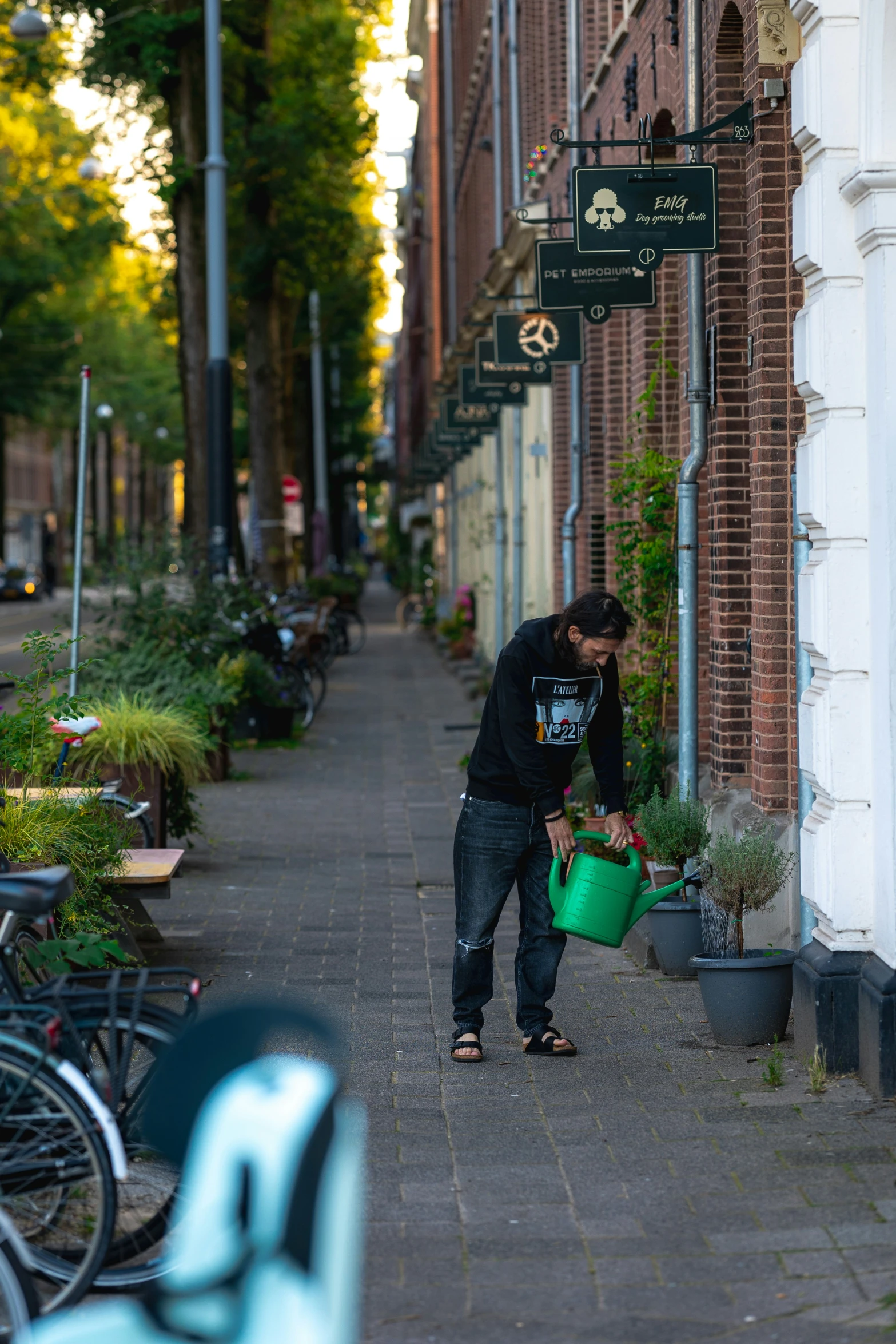 a man is pouring water into some containers