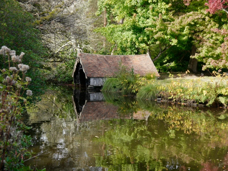 a small water shed on the bank of a lake