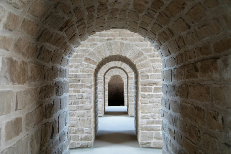 this is an image of a tunnel with brick walls