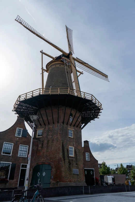 a po of a windmill in the sky