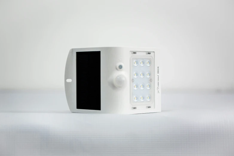 a white light on top of a device with different lights
