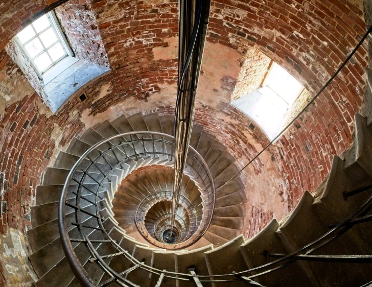 looking up a spirally staircase of some kind