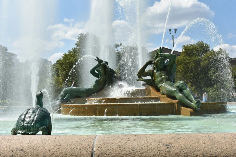 a view of two different fountains and statue statues