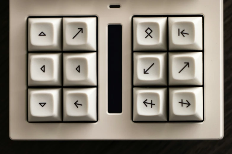 the top portion of a keyboard with several different symbols