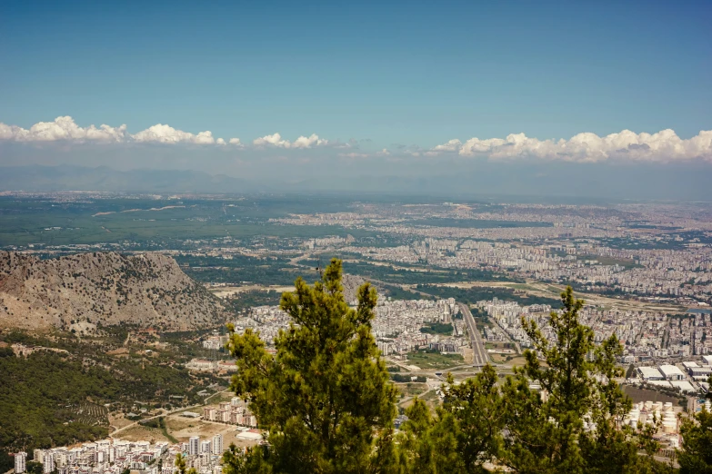 a city and mountain range from above