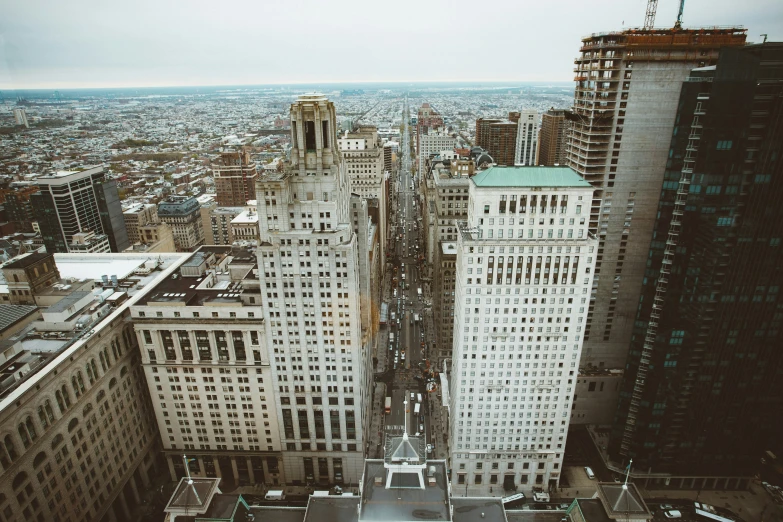 an overhead s of a wide city with tall buildings