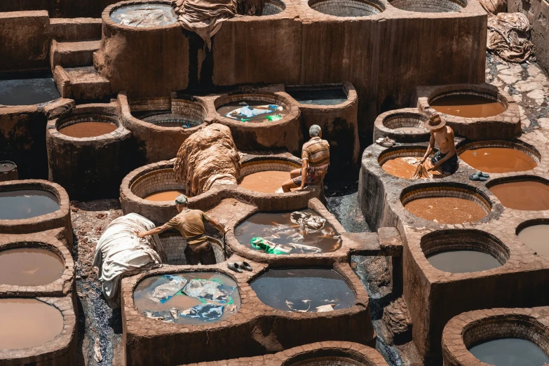 some kind of village with lots of mud pots