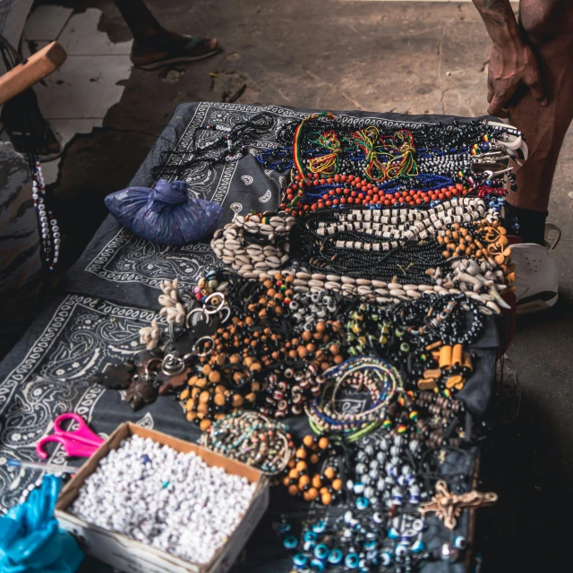 a variety of beads are spread out on a table