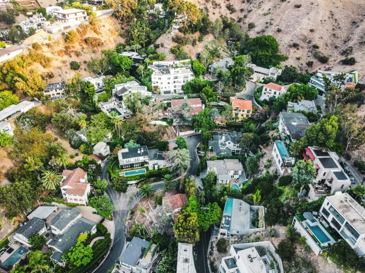 an aerial view of a street and lots of buildings