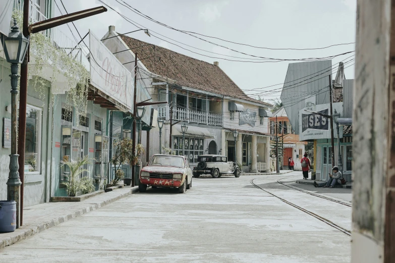 the cars are parked on the side of the street