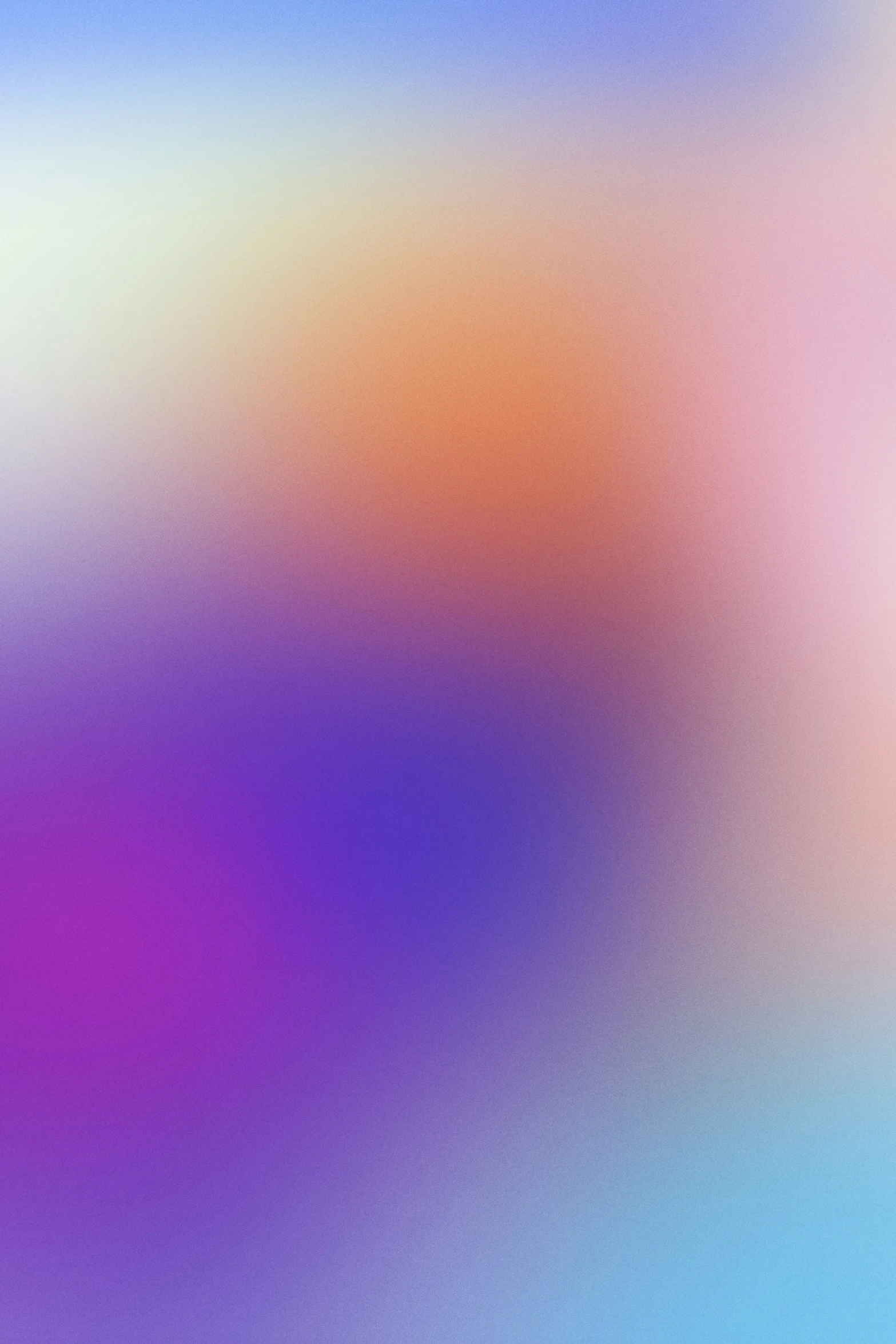 a blurred background of pink and blue colors