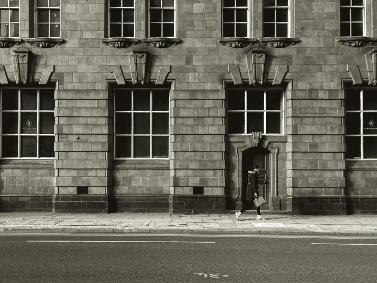 black and white po of an old building on the corner