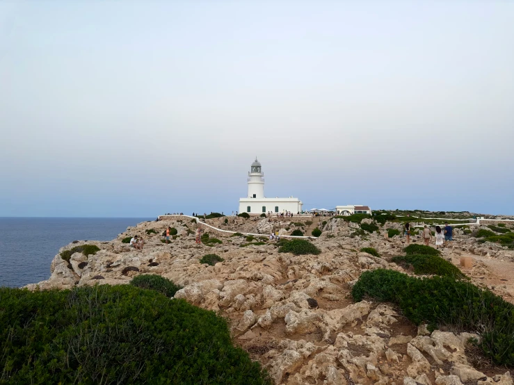 the lighthouse has a white bell tower