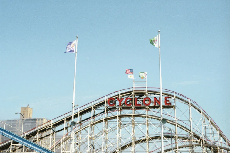 a sign is on top of the coaster