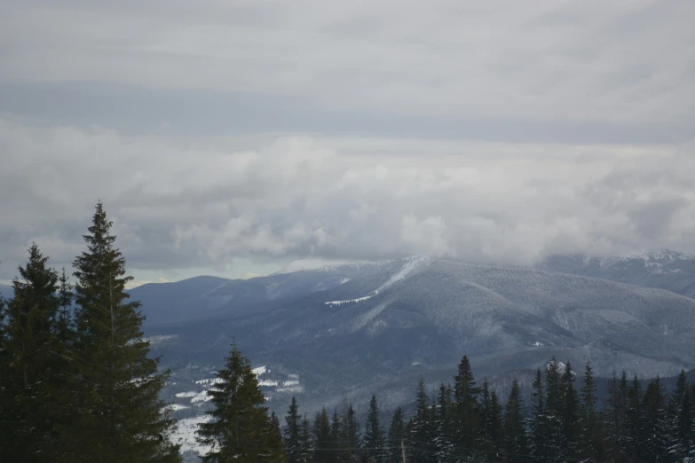 a landscape po looking at the mountains with some clouds