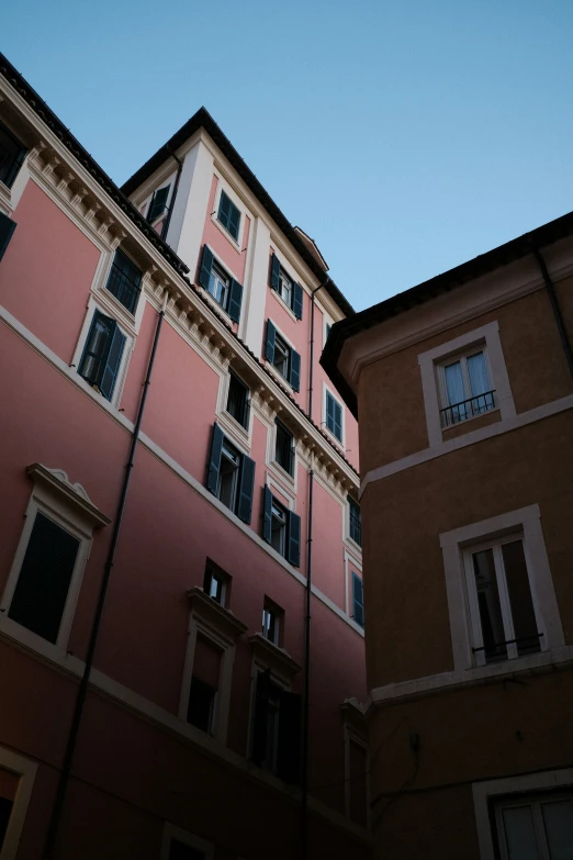 a po taken looking up at several buildings