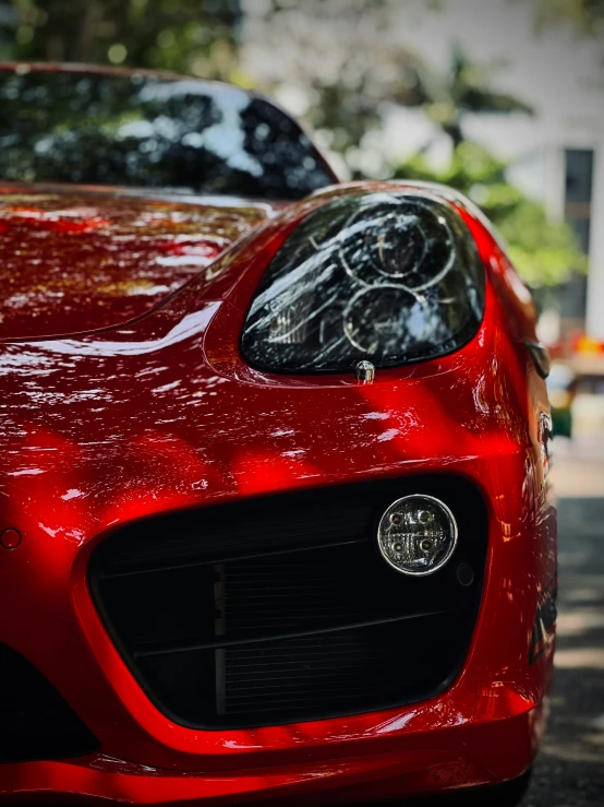 close up view of the front grille of a red car