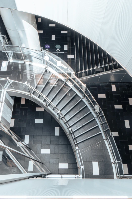 the staircases leading to a circular entrance